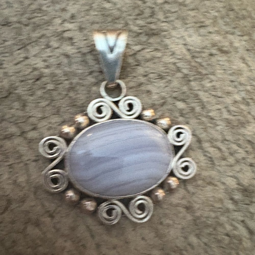GUC stamped.925 Mexico pendant